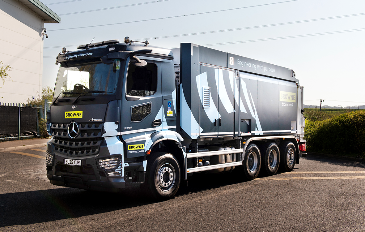 Browne Group - A large Mercedes-Benz waste collection truck with Browne branding parked on a sunny street.